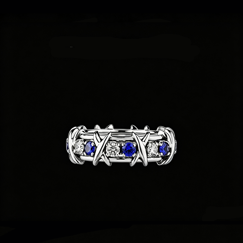 The Sapphire Eclipse Eternity Ring | 18K Solid White Gold Alternating Royal Blue Sapphire and Lab Grown Diamond Interlocking X Woven Band